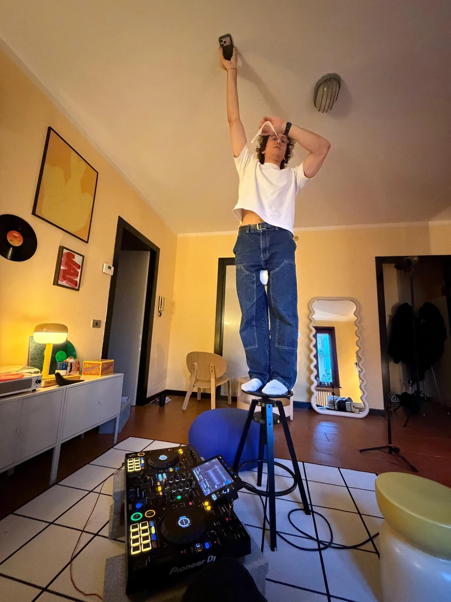 A performer and lighting equipment during filming