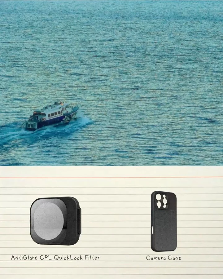 A person floating in blue water above a lens diagram