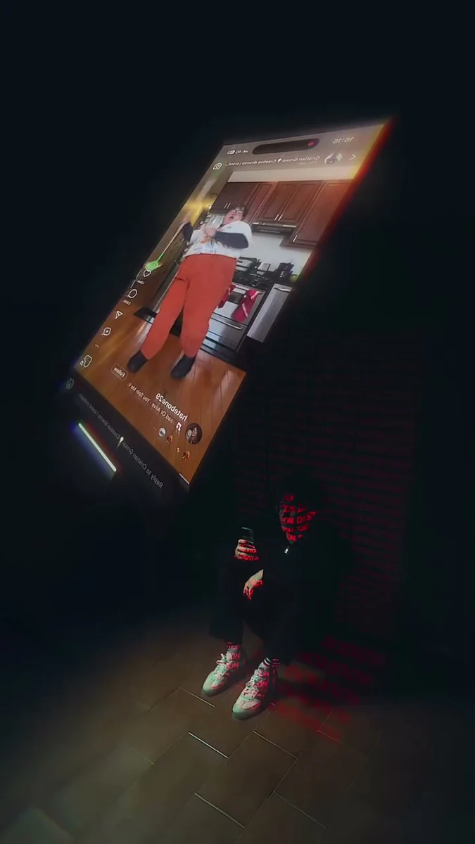 A phone screen lit in a dark room